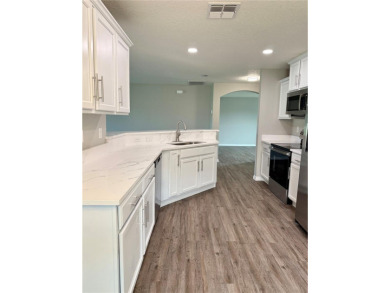 Welcome to this stunning 3-bedroom, 2-bath home located in the on Sherman Hills Golf Club in Florida - for sale on GolfHomes.com, golf home, golf lot