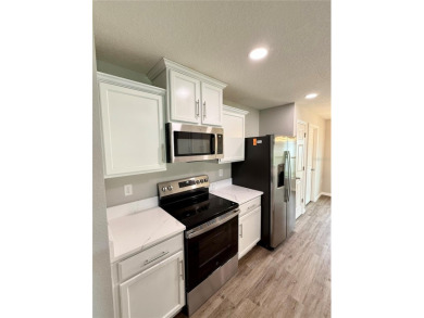 Welcome to this stunning 3-bedroom, 2-bath home located in the on Sherman Hills Golf Club in Florida - for sale on GolfHomes.com, golf home, golf lot