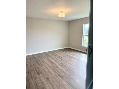 Welcome to this stunning 3-bedroom, 2-bath home located in the on Sherman Hills Golf Club in Florida - for sale on GolfHomes.com, golf home, golf lot