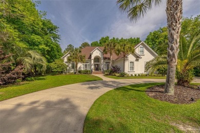 Custom built with abundant amenities...discover the epitome of on Oak Grove Island Golf and Country Club in Georgia - for sale on GolfHomes.com, golf home, golf lot