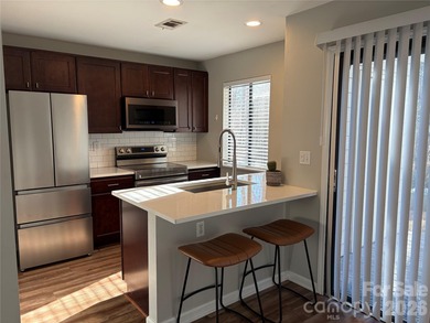 Beautiful 2 bedroom townhouse. Located in the desirable Raintree on Raintree Country Club in North Carolina - for sale on GolfHomes.com, golf home, golf lot