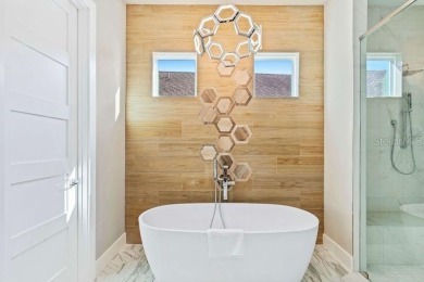 PRICED BELOW APPRAISED VALUE! Presenting a premier turnkey on Reunion Resort Golf Course in Florida - for sale on GolfHomes.com, golf home, golf lot