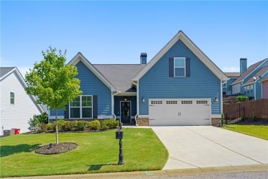 Welcome to this charming home in the highly sought-after on Traditions of Braselton Golf Club in Georgia - for sale on GolfHomes.com, golf home, golf lot