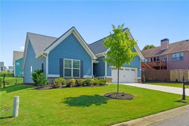 Welcome to this charming home in the highly sought-after on Traditions of Braselton Golf Club in Georgia - for sale on GolfHomes.com, golf home, golf lot