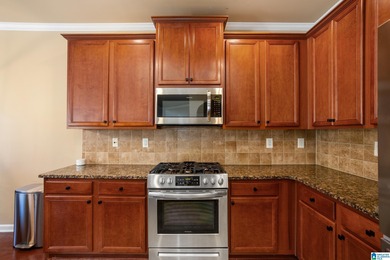 STRESS FREE LIVING in Cider Ridge! End unit provides privacy on Cider Ridge Golf Club in Alabama - for sale on GolfHomes.com, golf home, golf lot