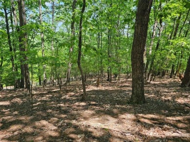 Nestled within the serene and exclusive Big Canoe community in on Big Canoe Golf Club - Cherokee in Georgia - for sale on GolfHomes.com, golf home, golf lot