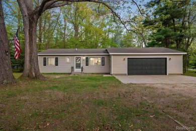 Welcome to this charming and updated ranch in the heart of on Burning Oak Country Club in Michigan - for sale on GolfHomes.com, golf home, golf lot