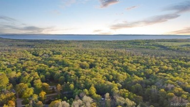 Welcome to this charming and updated ranch in the heart of on Burning Oak Country Club in Michigan - for sale on GolfHomes.com, golf home, golf lot