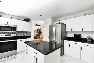 Impeccably maintained Danforth model 3/2/2 home with huge lanai on Burnt Store Golf Club in Florida - for sale on GolfHomes.com, golf home, golf lot