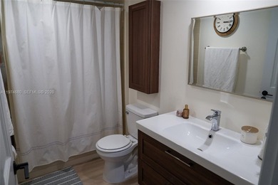 Spacious 2BR/2BA condo offering 1,385 sq ft in the desirable on Pine Island Ridge Country Club in Florida - for sale on GolfHomes.com, golf home, golf lot