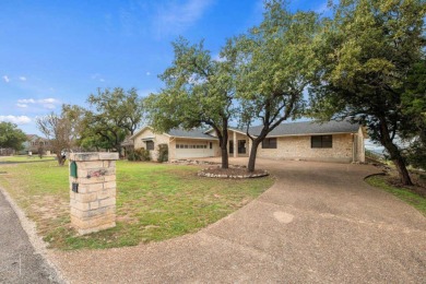 This charming single-story stone home, nestled in the heart of on Lakeway Golf and Country Club in Texas - for sale on GolfHomes.com, golf home, golf lot