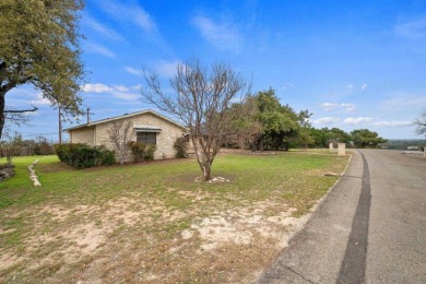 This charming single-story stone home, nestled in the heart of on Lakeway Golf and Country Club in Texas - for sale on GolfHomes.com, golf home, golf lot