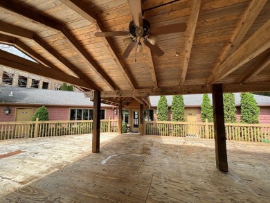 Welcome to Mountain Harbour! Discover the ultimate blend of on Chatuge Shores Golf Course in North Carolina - for sale on GolfHomes.com, golf home, golf lot