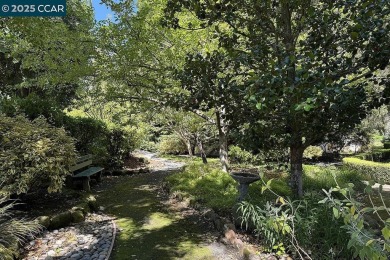 Discover this stunning remodeled COOP in one of Rossmoor's most on Rossmoor Golf Course in California - for sale on GolfHomes.com, golf home, golf lot