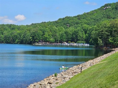 Nestled within the serene and exclusive Big Canoe community in on Big Canoe Golf Club - Cherokee in Georgia - for sale on GolfHomes.com, golf home, golf lot