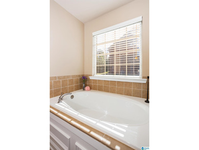 STRESS FREE LIVING in Cider Ridge! End unit provides privacy on Cider Ridge Golf Club in Alabama - for sale on GolfHomes.com, golf home, golf lot