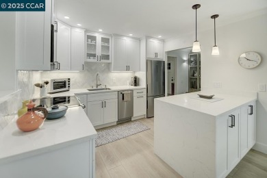 Discover this stunning remodeled COOP in one of Rossmoor's most on Rossmoor Golf Course in California - for sale on GolfHomes.com, golf home, golf lot