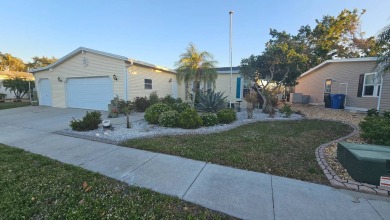 Welcome to 2009 Pier Drive, nestled in the prestigious Riverside on The Riverside Golf Club in Florida - for sale on GolfHomes.com, golf home, golf lot