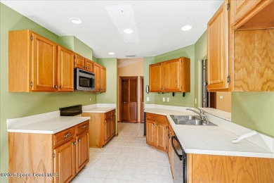 This beautiful half duplex is a lucrative investment opportunity on Suntree Country Club in Florida - for sale on GolfHomes.com, golf home, golf lot