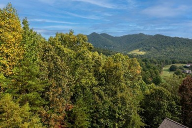 This lot is waiting for you to bring your house plan and begin on Mountain Harbour Golf Club in North Carolina - for sale on GolfHomes.com, golf home, golf lot