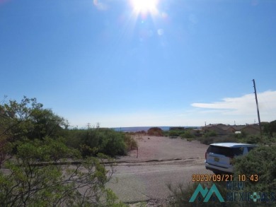 Lake view from this 0.68 acre lot in Elephant Butte. Build your on Sierra Del Rio Golf Club in New Mexico - for sale on GolfHomes.com, golf home, golf lot