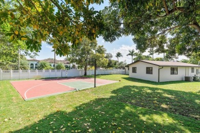 Stunning 4-bedroom, 3-full-bath oasis is nestled in the on Fort Lauderdale Country Club in Florida - for sale on GolfHomes.com, golf home, golf lot