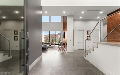 Located on a double-gated street in the prestigious MacDonald on Dragon Ridge Country Club in Nevada - for sale on GolfHomes.com, golf home, golf lot