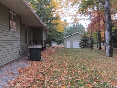 Nicely updated and well maintained year round ranch home offers on Lost Lake Woods Club in Michigan - for sale on GolfHomes.com, golf home, golf lot