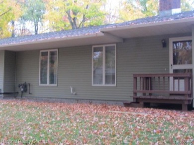 Nicely updated and well maintained year round ranch home offers on Lost Lake Woods Club in Michigan - for sale on GolfHomes.com, golf home, golf lot