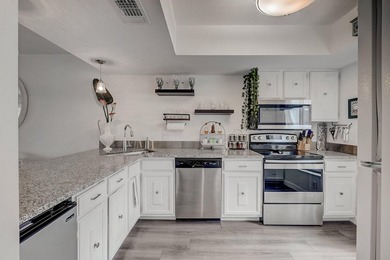 Premium Views of the 6th hole from two levels. Popular townhome on Riverbend Golf Club in Florida - for sale on GolfHomes.com, golf home, golf lot