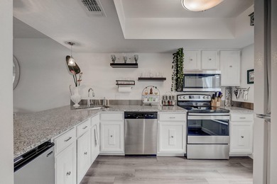 Premium Views of the 6th hole from two levels. Popular townhome on Riverbend Golf Club in Florida - for sale on GolfHomes.com, golf home, golf lot