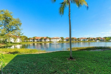 Enjoy breathtaking panoramic lake views from this charming on PGA National Golf Club in Florida - for sale on GolfHomes.com, golf home, golf lot
