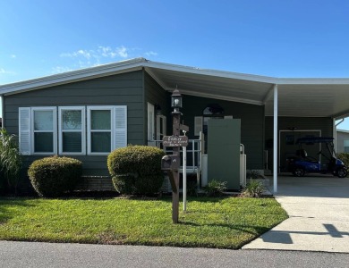 This 2-bedroom, 2-bathroom home offers a perfect place for on Lake Henry Golf Club in Florida - for sale on GolfHomes.com, golf home, golf lot