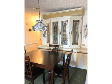 This 2-bedroom, 2-bathroom home offers a perfect place for on Lake Henry Golf Club in Florida - for sale on GolfHomes.com, golf home, golf lot
