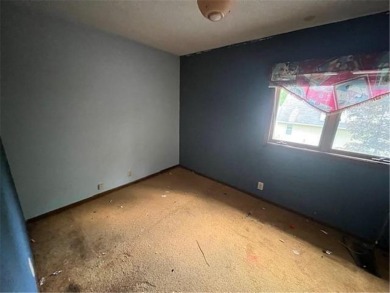 In the heart of town, this 2 story is nestled in between mature on The Amery Golf Club in Wisconsin - for sale on GolfHomes.com, golf home, golf lot