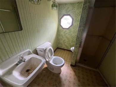 In the heart of town, this 2 story is nestled in between mature on The Amery Golf Club in Wisconsin - for sale on GolfHomes.com, golf home, golf lot