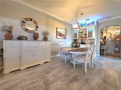 Welcome to a villa that understands the assignment; effortless on Pelican Preserve Golf Club in Florida - for sale on GolfHomes.com, golf home, golf lot