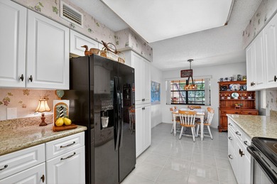 Location, location, location!  Beautifully appointed 3 bedroom on Indian Spring Golf and Country Club in Florida - for sale on GolfHomes.com, golf home, golf lot