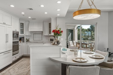 Situated within the exclusive, gated enclave of The Anchorage at on Sandestin Golf and Beach Resort - Raven in Florida - for sale on GolfHomes.com, golf home, golf lot