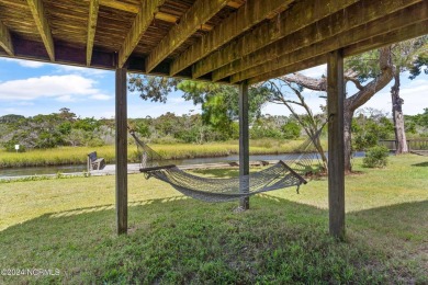 Price Reduction! Enjoy a third-row beach home that has a dock on on Founders Club At St. James Plantation in North Carolina - for sale on GolfHomes.com, golf home, golf lot