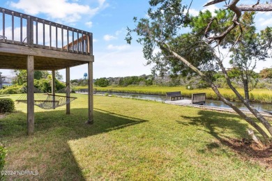 Price Reduction! Enjoy a third-row beach home that has a dock on on Founders Club At St. James Plantation in North Carolina - for sale on GolfHomes.com, golf home, golf lot