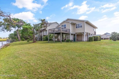 Price Reduction! Enjoy a third-row beach home that has a dock on on Founders Club At St. James Plantation in North Carolina - for sale on GolfHomes.com, golf home, golf lot