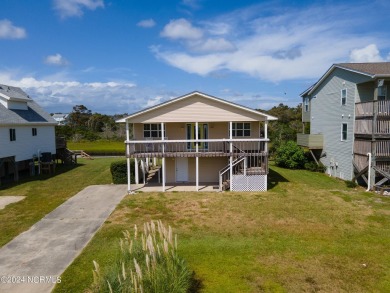 Price Reduction! Enjoy a third-row beach home that has a dock on on Founders Club At St. James Plantation in North Carolina - for sale on GolfHomes.com, golf home, golf lot