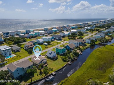 Price Reduction! Enjoy a third-row beach home that has a dock on on Founders Club At St. James Plantation in North Carolina - for sale on GolfHomes.com, golf home, golf lot