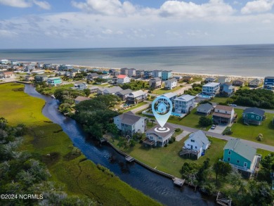 Price Reduction! Enjoy a third-row beach home that has a dock on on Founders Club At St. James Plantation in North Carolina - for sale on GolfHomes.com, golf home, golf lot