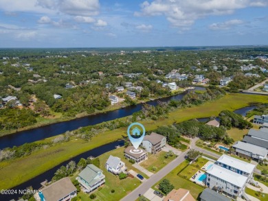 Price Reduction! Enjoy a third-row beach home that has a dock on on Founders Club At St. James Plantation in North Carolina - for sale on GolfHomes.com, golf home, golf lot