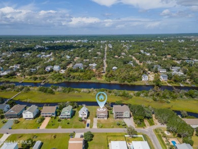 Price Reduction! Enjoy a third-row beach home that has a dock on on Founders Club At St. James Plantation in North Carolina - for sale on GolfHomes.com, golf home, golf lot