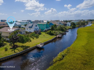 Price Reduction! Enjoy a third-row beach home that has a dock on on Founders Club At St. James Plantation in North Carolina - for sale on GolfHomes.com, golf home, golf lot