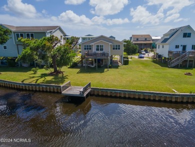 Price Reduction! Enjoy a third-row beach home that has a dock on on Founders Club At St. James Plantation in North Carolina - for sale on GolfHomes.com, golf home, golf lot