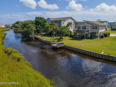 Price Reduction! Enjoy a third-row beach home that has a dock on on Founders Club At St. James Plantation in North Carolina - for sale on GolfHomes.com, golf home, golf lot